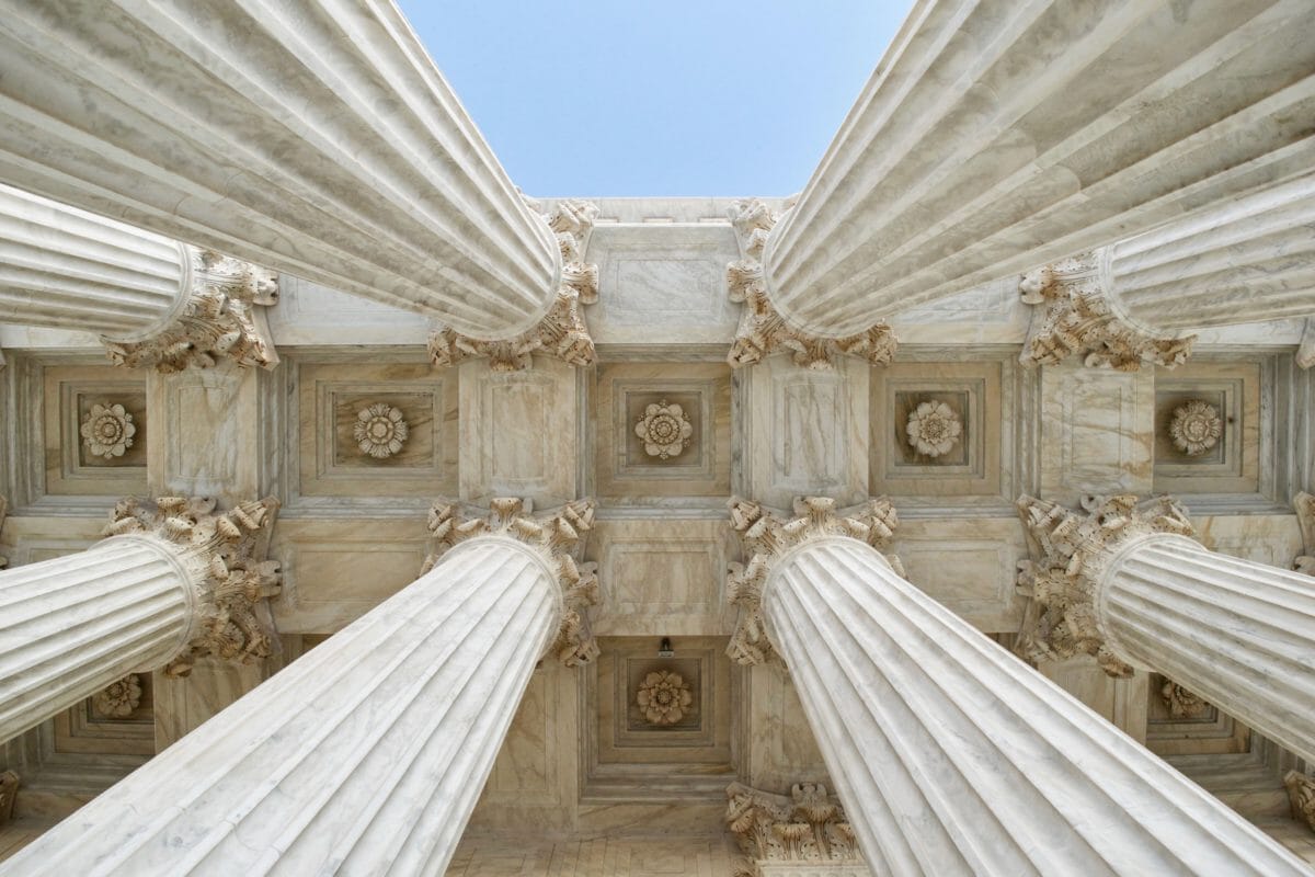 Upward view of government building columns